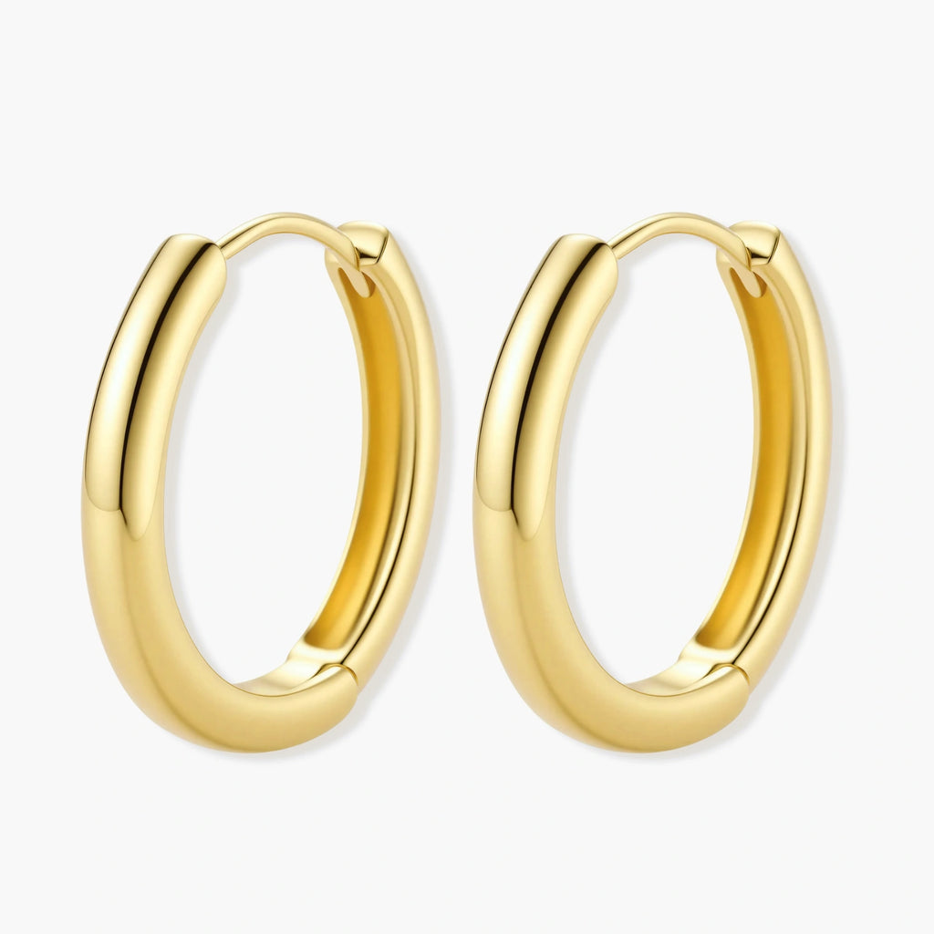 Polished gold-plated sterling silver hoop earrings with hinged closure mechanism on white background.